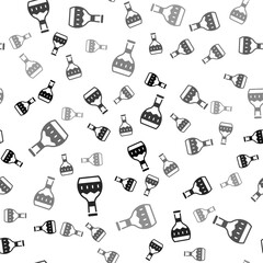 Black Tequila bottle icon isolated seamless pattern on white background. Mexican alcohol drink. Vector.