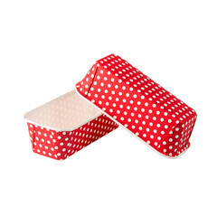 Red paper baking forms for cakes with dotted pattern