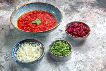 front view delicious borsch ukrainian beet soup with fresh cabbage and greens on white background photo color meal cabbage dish