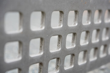 metal plate with openings, selective focus