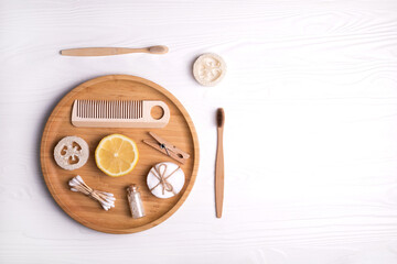Set of eco natural bathroom accessories on white background.