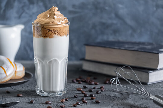 Atmospheric shot of dalgone coffee. Delicious milk drink with coffee foam.