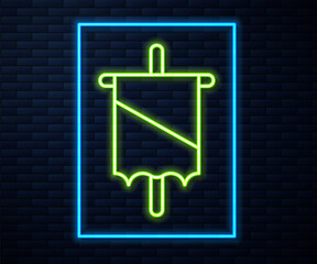 Glowing neon line Medieval flag icon isolated on brick wall background. Country, state, or territory ruled by a king or queen. Vector.