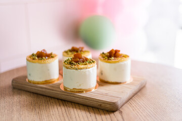 Delicious airy dessert mousse. Cake with berries. The treat is on a table in a cafe. Anna Pavlova