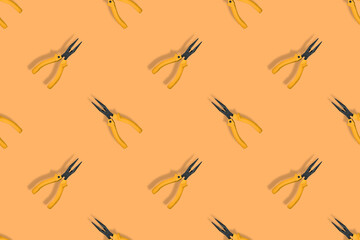 Seamless pattern.Seamless pattern of tools. Pliers background.