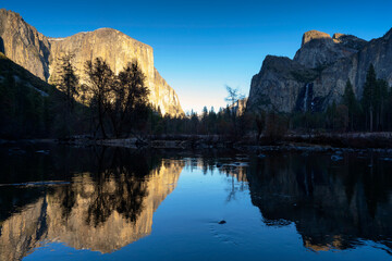 El Capitan, Half Dome, and Bridalveil Fall reflected on Merced river in Yosemite National Park. California. USA