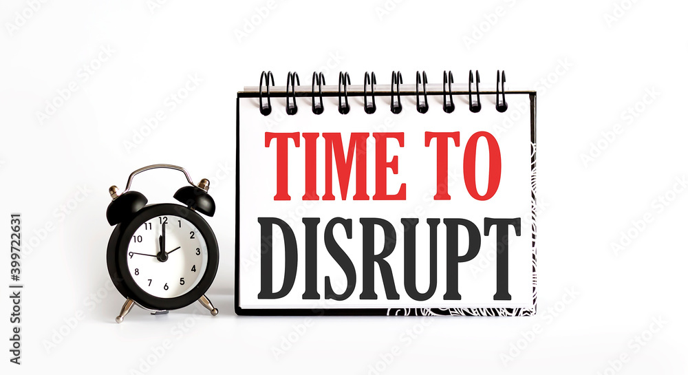 Poster time to disrupt notepad writing on the white background with alarm clock
