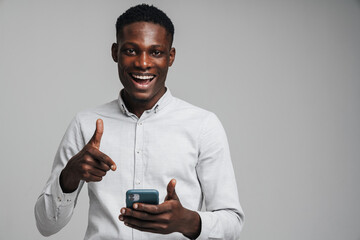 Handsome smiling young african busines man