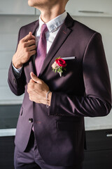 groom in a purple jacket, purple jacket