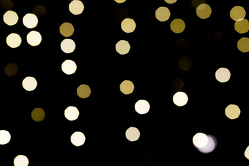 background with abstract lights defocused, beautiful shiny christmas lights, black backdrop with space for text
