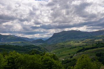 Fototapeta premium Mountain landscape against cloudy sky