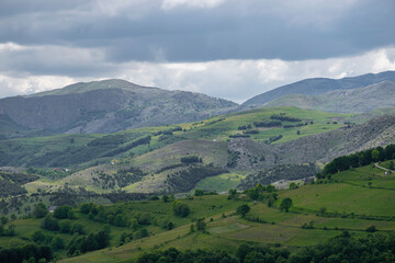Mountain landscape against cloudy sky