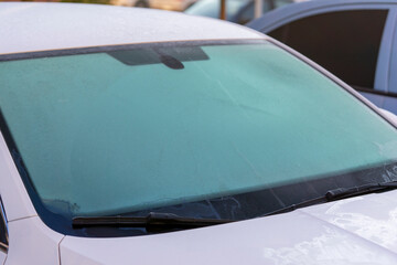 frozen car windshield in cold weather
