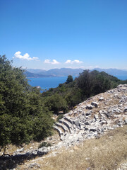 View for the ancient theater of Amos, Turkey surrounded by beautiful Aegean sea nature