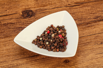 Peppercorn heap in the bowl