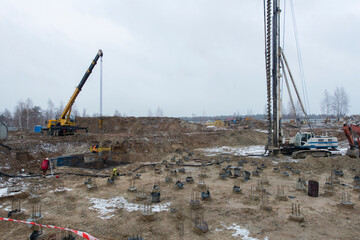 Installation of the foundation of the house at the construction site