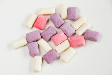 Different chewing gums on the white background