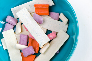 Different chewing gums on the white background