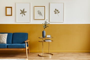 Unique living room in modern style interior with design sofa, elegant gold coffee table, mock up...