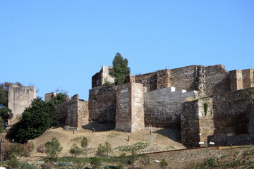 Fototapeta na wymiar Ancient walls of the Alcazaba fortress on mount Gibraltar in Malaga