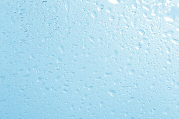 wet glass background condensate / abstract rain, drops texture on transparent glass