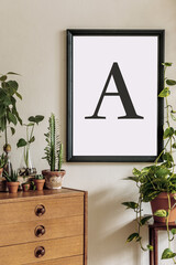 Stylish retro composition of living room with black mock up poster frame, vintage commode and stool, cacti plants and elegant personal accessories. Retro home decor. Beige background walls. Template.