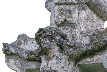 Ancient stone sculpture of Jesus Christ, crucified on a cross
