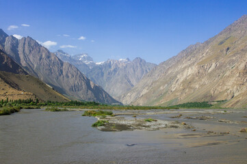 Panorama view of the Panj river valley border between Tajikistan and Afghanistan near Khorog capital of Gorno-Badakshan in the Tajikistan Pamir
