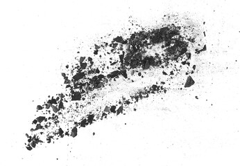 Fototapeta premium Black charcoal particles isolated on a white background, top view. Activated charcoal powder for facial mask. Black dust powder charcoal.