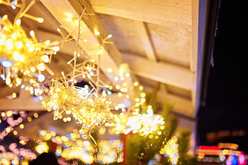Christmas decorations on the street, colorful holiday bokeh lights, city night illumination