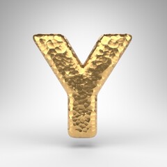 Letter Y uppercase on white background. Hammered brass 3D letter with shiny metallic texture.