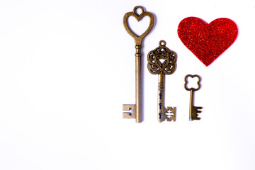 Valentines day concept red heart and keys on a white background