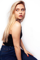 Fototapeta premium young blond woman on white backgroung gesture thumbs up, isolated emotional posing