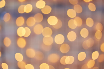 Golden beautiful blurred bokeh background with copy space.