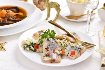 herring slices marinated in oil for Christmas