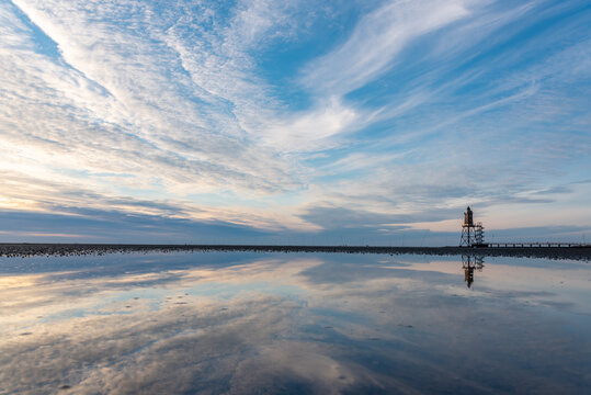 Wadden Sea with Lighthouse Obereversand in Dorum-Neufeld