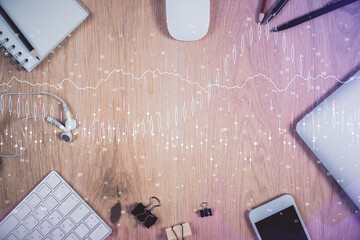 Multi exposure of forex graph hologram over desktop with phone. Top view. Mobile trade platform...