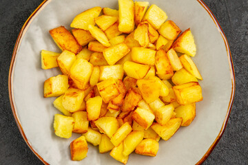 top view delicious fried potatoes inside plate on dark background oil french fries food dinner photo color