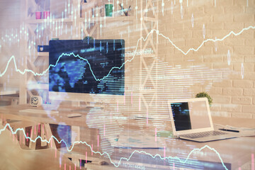 Double exposure of financial graph drawing and office interior background. Concept of stock market.