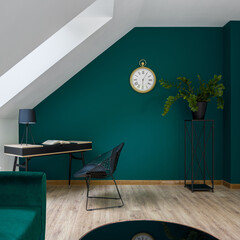 Attic room with emerald green wall