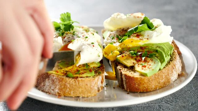 bread toast with avocado and poached egg