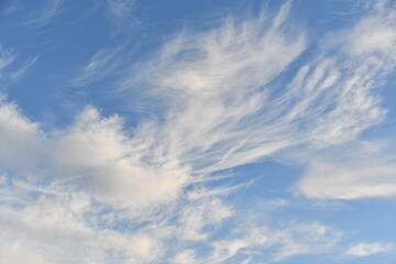 The white clouds in the blue sky