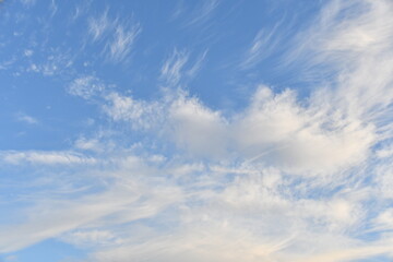 The white clouds in the blue sky