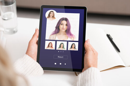 Woman Using Hair Color Simulation App On Digital Tablet, Trying Different Hairstyles