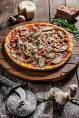 Italian pizza on wooden board