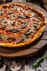 Italian pizza on wooden board