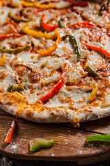 Italian pizza on wooden board