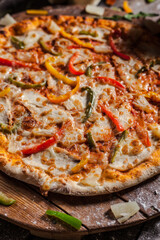 Italian pizza on wooden board