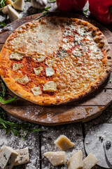 Italian pizza on wooden board