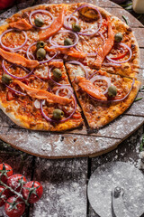 Italian pizza on wooden board